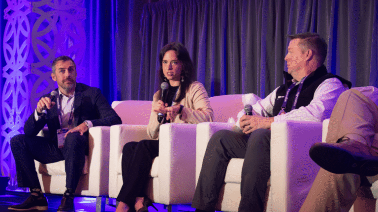 Speakers on stage - Blog Post